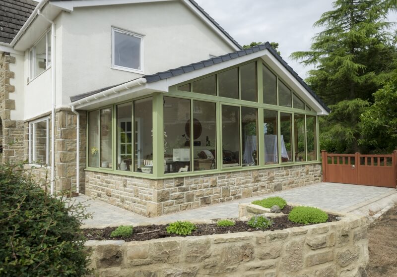A Solid Roof Conservatory in Green.